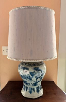a lamp that is sitting on a table in a room
