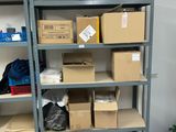 many boxes on the shelves in the room