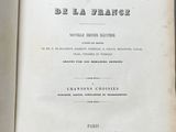 an open book with a black and white title on it