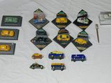 a lot of different toy vehicles on the table