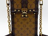 louis vuittoupe cross body bag in brown and brown