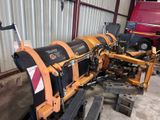 an image of a tractor that is parked in a garage