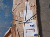 a wooden bench that is wrapped up and ready to be shipped