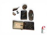 a lot of items that are sitting on a white surface