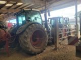 a tractor that is parked inside of a building