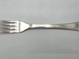 a fork that is sitting on a table