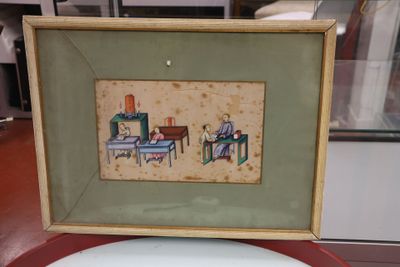 une photo d'une photo représentant un homme et une femme assis à une table