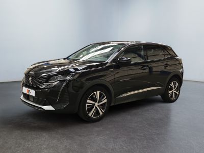 a black car parked in a room with a black floor