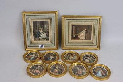 several framed pictures of women and children in gold frames