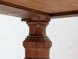 a close up of a wooden table on a white background