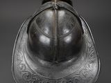 a close up of a helmet on a black background