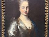 a painting of a woman in a blue dress and gold trim