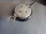 a small metal object that is sitting on a table