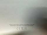 an image of a close up of a laptop computer on a table