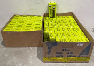 a box full of yellow batteries sitting on the floor