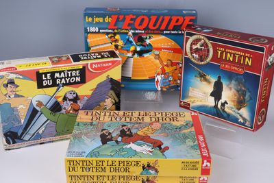 several children ' s board games are sitting on a white surface