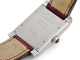 an image of a close up of a watch on a white surface