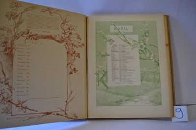 an open book with a picture of a tree on it