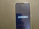 someone is taking a picture of a cell phone with the adoeu logo on it