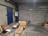 a room with a lot of boxes and boxes on the floor