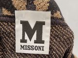 a close up of a person ' s hat with a missoni label on it