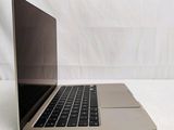 a laptop computer sitting on a table with a white background