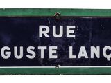 an image of a street sign that reads rue auguste lanon