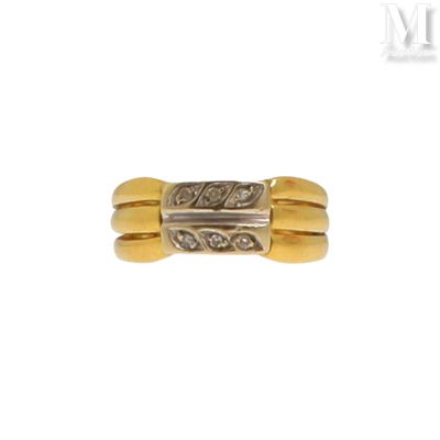 a close up of a gold ring with diamonds on a white background