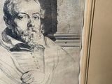 an old picture of a man with a beard in a frame