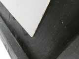 a black and white picture of a corner of a room