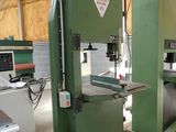 two machines that are sitting in a building