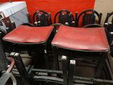 a lot of chairs that are sitting in a room