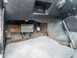 a close up view of a car ' s dashboard and floor