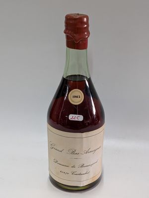 a bottle of wine that is sitting on a table