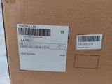 packaging of a brown box with a bar code on it