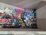 a box full of nail polish and nail vares