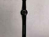 a watch that is laying on a table