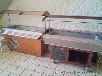 a kitchen with a sink and a counter in it