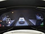 the dashboard of a car with a digital display on it