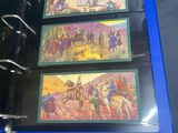 a blue binder with a picture of a man riding a horse