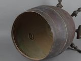 a metal container with a spiky design on it