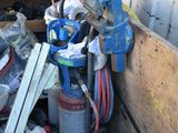 a pile of assorted items in the back of a truck