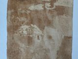 an old photo of a piece of paper with writing on it
