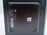 a black box with a sticker on it on a white surface