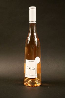 a bottle of wine that is sitting on a table