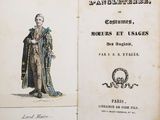 un vieux livre sur lequel figure le dessin d'un homme en robe