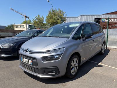 the citrole is parked in a parking lot next to other cars