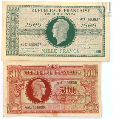 two old french bank notes with a picture of a man on one of them