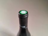 a bottle of wine that is sitting on a table