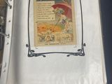 a picture of a book with a picture of a woman holding an umbrella